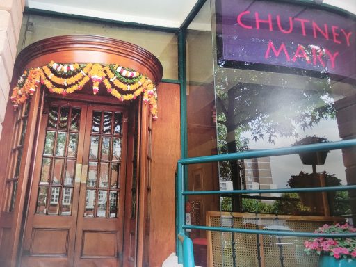 Entrance to Chutney Mary adorned with decorative garlands.